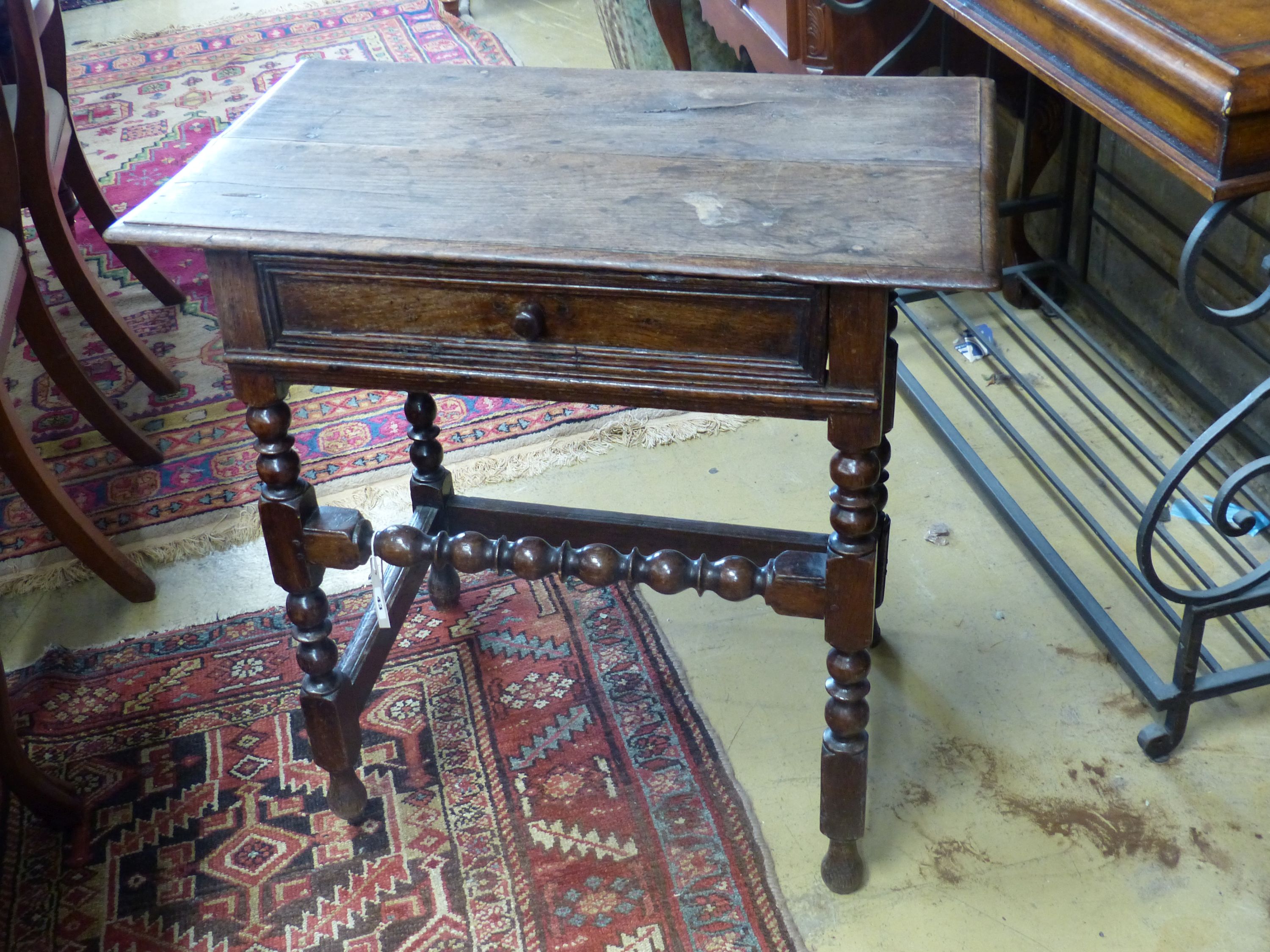 An oak side table, 18th century and later, width 76cm, depth 47cm, height 75cm